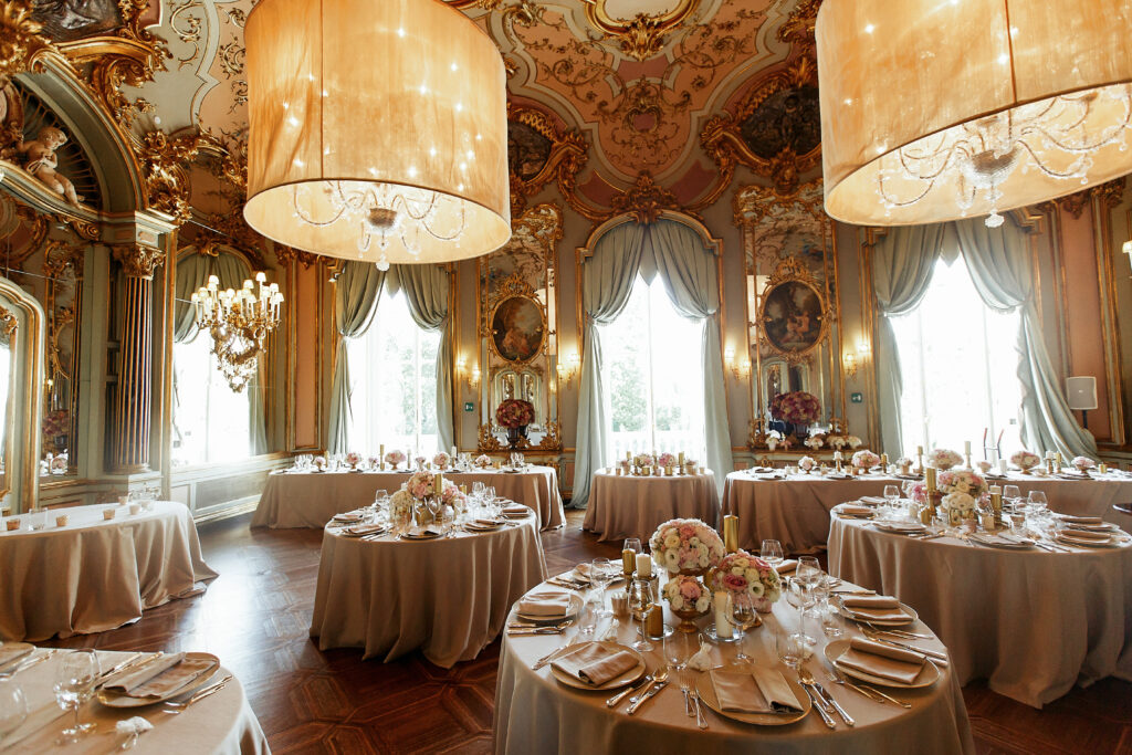 Gorgeous Italian hall with paintings on the wall and prepared fo